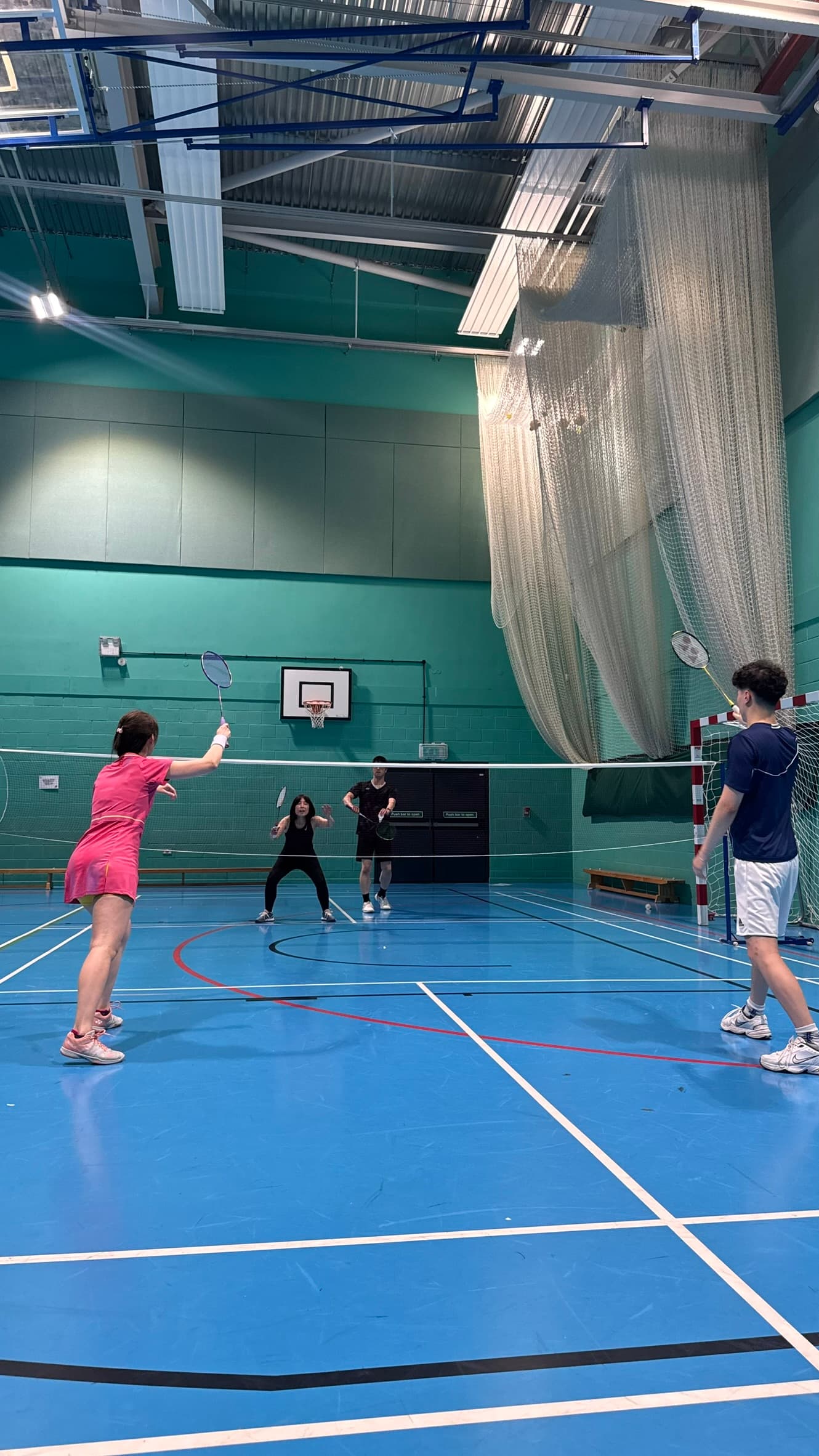 Mixed level social badminton games at Angel Wings