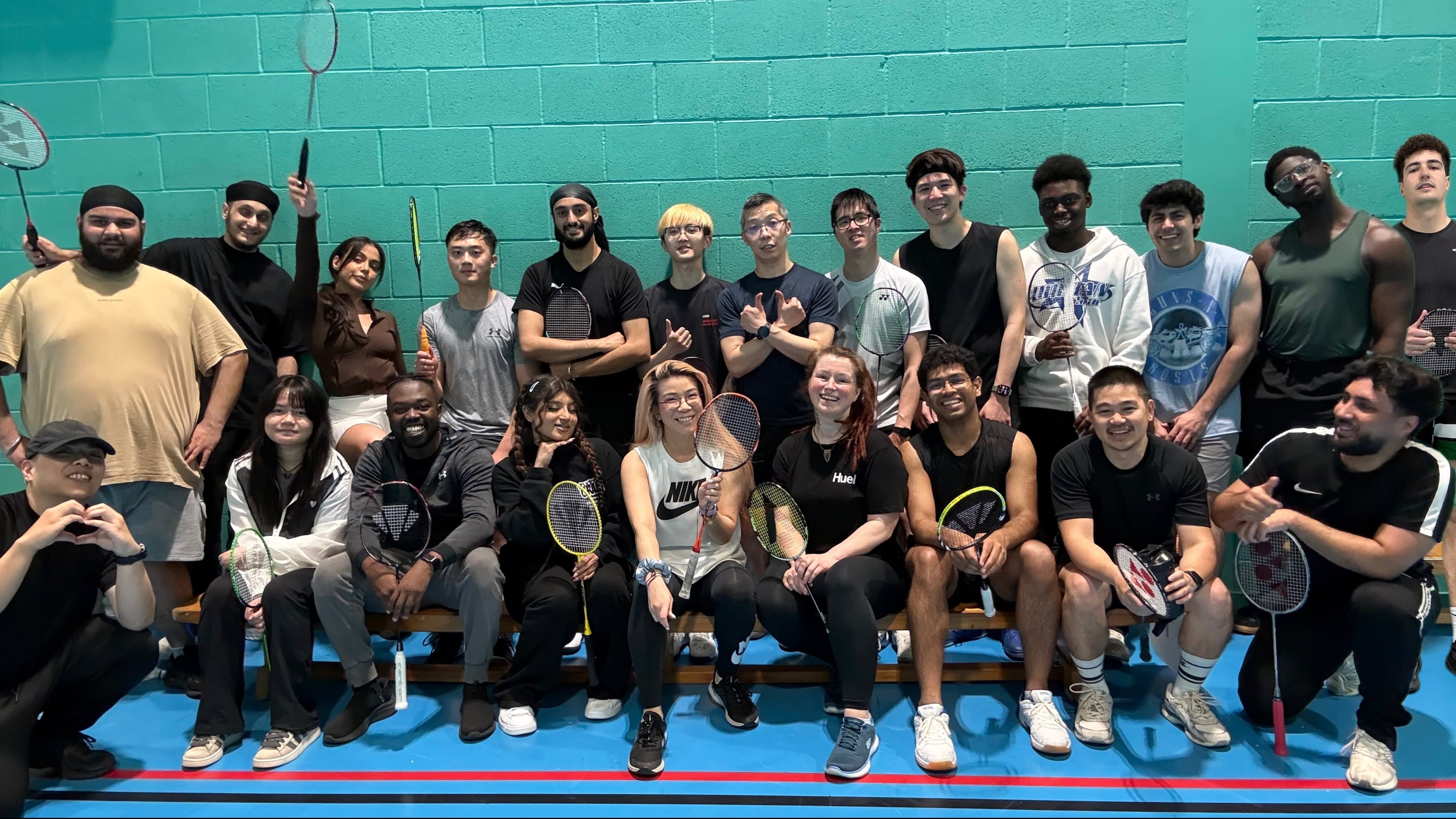 Friendly social badminton match at an Angel Wings Birmingham session